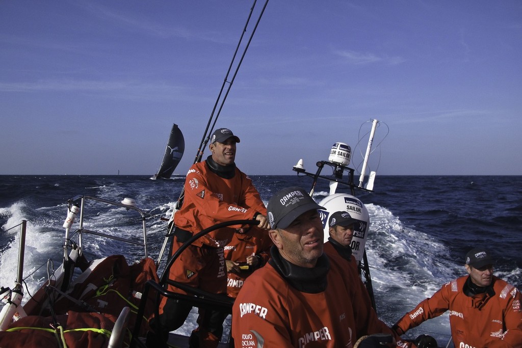 Stu Bannatyne on the helm with Puma in close pursuit onboard Camper with Emirates Team New Zealand during leg 2 of the Volvo Ocean Race 2011-12, from Cape Town, South Africa to Abu Dhabi, UAE.  © Emirates Team New Zealand http://www.etnzblog.com
